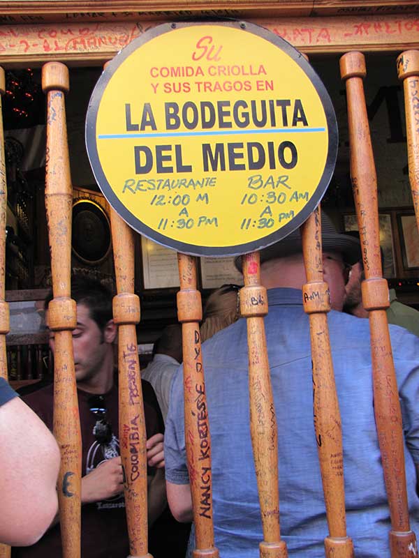 Bar in Havana, Cuba allows patrons to write their names on walls and much